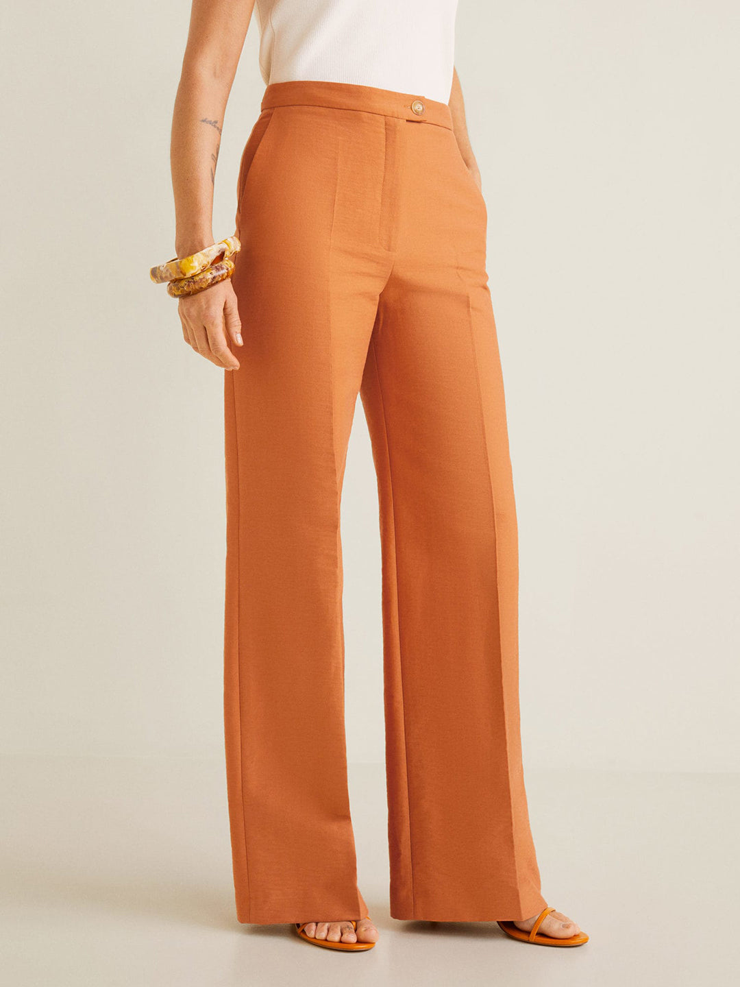 Women Orange Loose Fit Solid Parallel Trousers